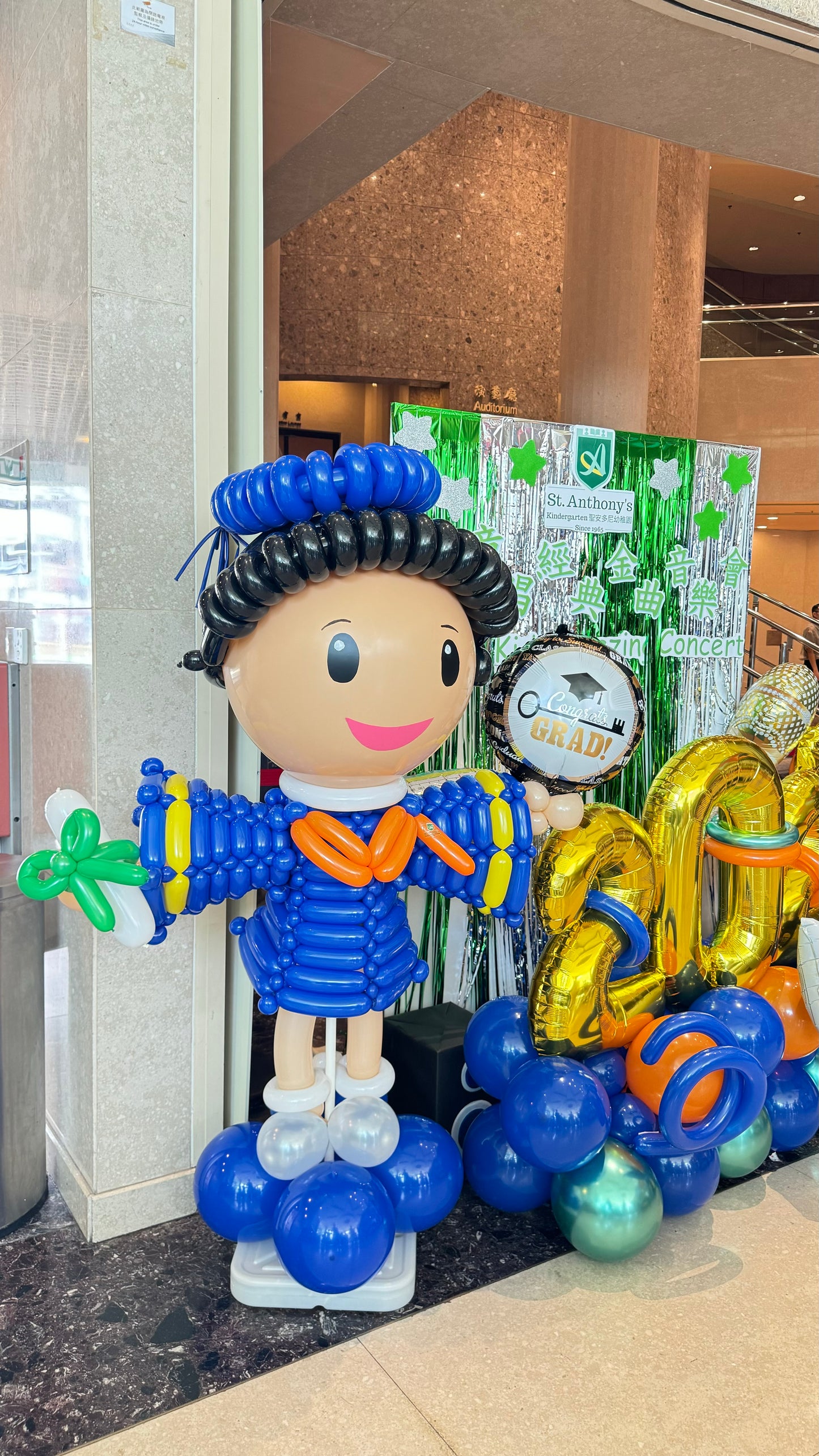 School graduation balloon doll